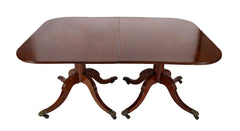 A Regency Double Pillar Two Part Mahogany Tilt Top Dining Table