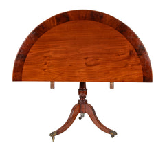 A George III Two Part Tilting Demi Lune Section Mahogany Dining Table