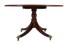 A Regency Mahogany Satinwood Banded Tilt Top Center Table