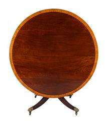 A Regency Mahogany Satinwood Banded Tilt Top Center Table