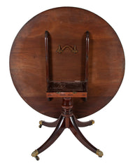 A Regency Mahogany Satinwood Banded Tilt Top Center Table