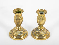 Pair of French Louis XVI Gilt Bronze Candlesticks