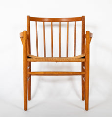 A Jorgen Baemark for FDB Mobler Oak Framed Armchair with Papercord Seat