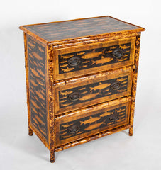 A Bamboo Three Drawer Bureau with Decoupaged Fish Prints