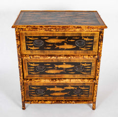 A Bamboo Three Drawer Bureau with Decoupaged Fish Prints