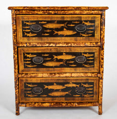 A Bamboo Three Drawer Bureau with Decoupaged Fish Prints