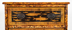 A Bamboo Three Drawer Bureau with Decoupaged Fish Prints