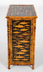 A Bamboo Three Drawer Bureau with Decoupaged Fish Prints