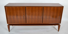 A Mid-Century Gio Ponti Walnut Three Door "Floating" Cabinet