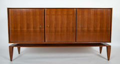 A Mid-Century Gio Ponti Walnut Three Door "Floating" Cabinet