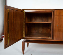 A Mid-Century Gio Ponti Walnut Three Door "Floating" Cabinet