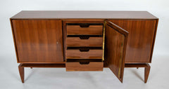 A Mid-Century Gio Ponti Walnut Three Door "Floating" Cabinet