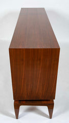 A Mid-Century Gio Ponti Walnut Three Door "Floating" Cabinet