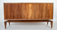 A Mid-Century Gio Ponti Walnut Three Door "Floating" Cabinet