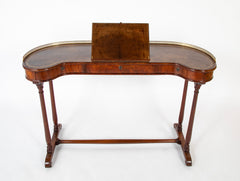 An English Regency Kidney Shaped Mahogany Desk