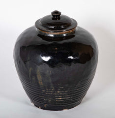 A Chinese Henan Dark Glaze Lidded Jar