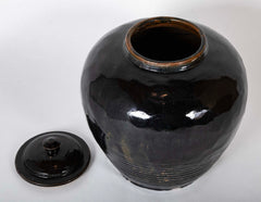 A Chinese Henan Dark Glaze Lidded Jar