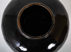 A Chinese Henan Dark Glaze Lidded Jar