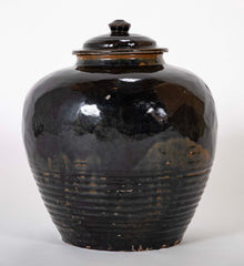 A Chinese Henan Dark Glaze Lidded Jar