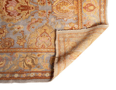 A Spanish Wool Carpet Having Floral Motifs