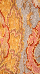 A Spanish Wool Carpet Having Floral Motifs