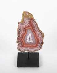 A Split Laguna Agate Geode Now on Two Modern Stands