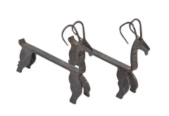 A Pair of Amusing English Wrought Iron Andirons