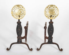 A Set of Heavy Iron Andirons with Pierced Brass Medallions