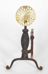 A Set of Heavy Iron Andirons with Pierced Brass Medallions