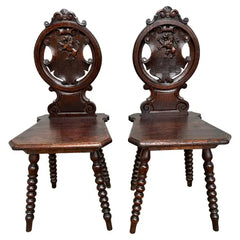 Pair 18th Century Italian Chestnut Hall Chairs Carved With Lion Crests