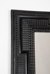 An Ebonized Dutch Baroque Style Mirror