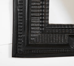 An Ebonized Dutch Baroque Style Mirror