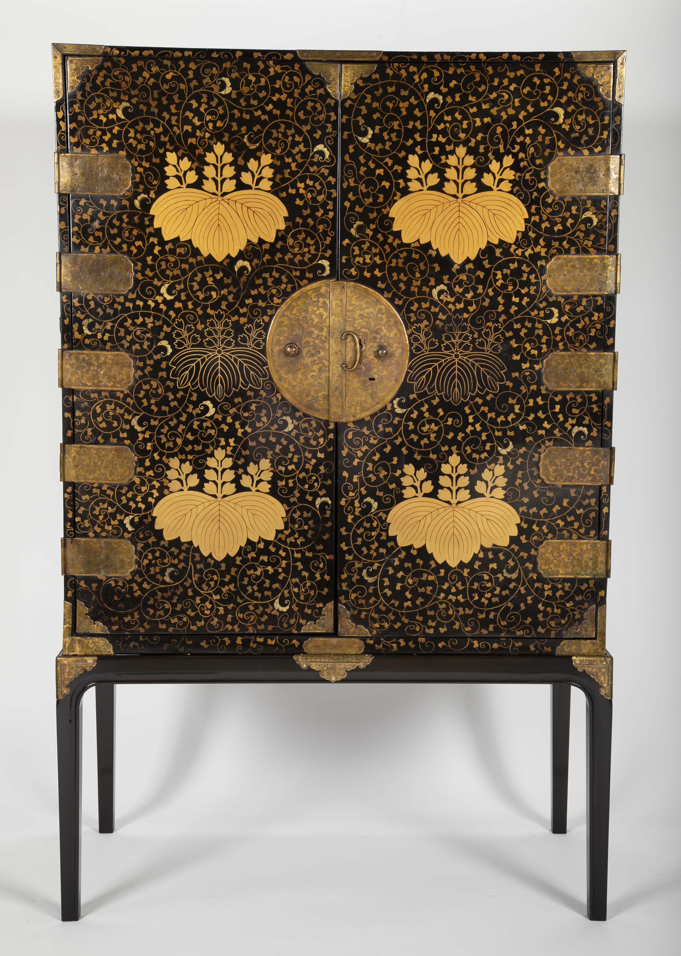 A Japanese Laquer Cabinet in picturial style